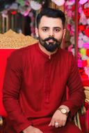 SHAH G